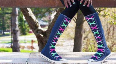 Blue extra high top sneakers with colorful laces